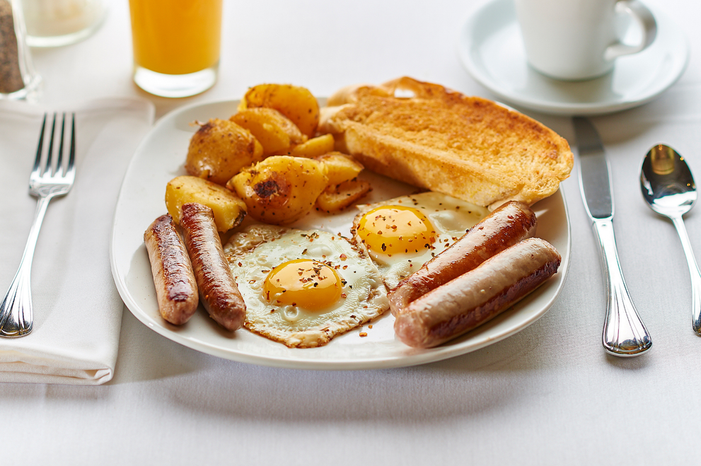 Breakfast plate of high-pufa eggs and sausage.